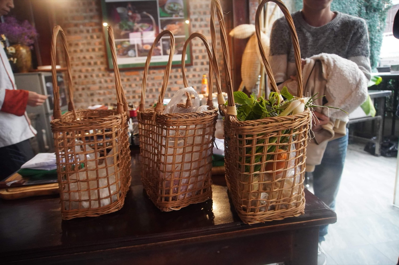 Fresh market ingredients in woven baskets